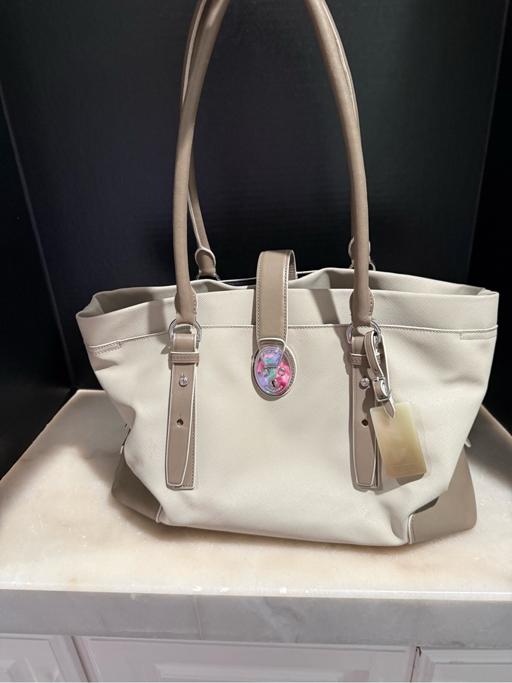 Tumi Villa Turin tote bag tan leather trim distinctive silver hardware
